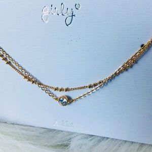 Dainty 2 chained gold ankle bracelet.